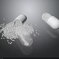 White Food Pellets Spilled From Open Capsule On Black Surface