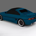 Blue Sports Car With Black Roof Rear Spoiler And Stylish Black Wheels