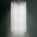 Modern Elegant Chandelier with Clear Vertical Glass Tubes Against Dark Background