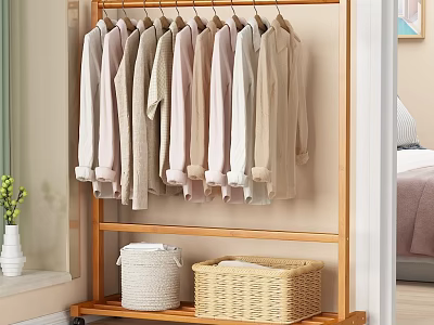 Bamboo Clothes Rack with Light Colored Clothes Hanging and Storage Baskets in Bedroom Area 3d model