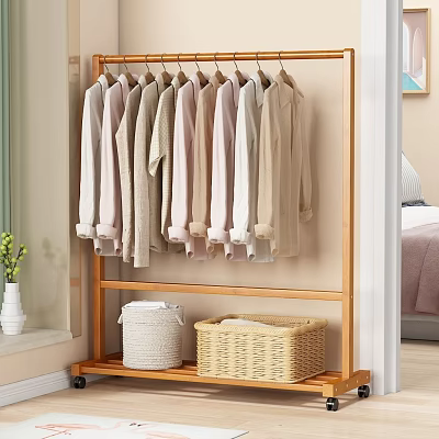 Bamboo Clothes Rack with Light Colored Clothes Hanging and Storage Baskets in Bedroom Area 3d model