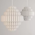Two Elegant Modern Crystal Chandeliers With Multi Layer Design Hanging On Gray Wall