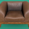 Brown Textured Leather Single Sofa With Wide Arms And Wooden Legs
