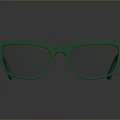 Green Sunglasses With Square Frame Green Lenses And Metal Rivets On Smooth Reflective Surface