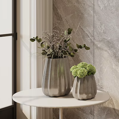 Textured Silver Vases With Green Plants And Spherical Flowers On White Round Table 3d model