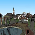 Traditional And Modern Buildings On Commercial Street With Outdoor Seating And Street Lamps