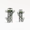 Two Green Metal Watchtowers With Staircases And Observation Platforms