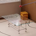 Sleek Glass Top Coffee Table With Metal Frame In Modern Living Room Space