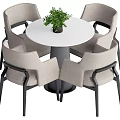 Modern Round White Dining Table Set With Four Light Gray Chairs And Black Legs