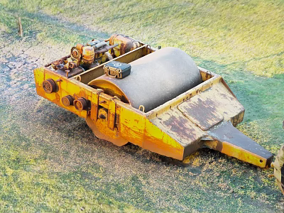 Utility Vehicle Yellow Rusty Drum Component Lying On Green Grass Field 3d model