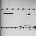 Modern Chandeliers With Linear And Circular Designs Featuring Multiple Lights And Black Frames 3d model