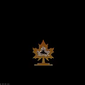 Golden Maple Leaf Shaped Art Installation With Hollow Texture And Base Stand