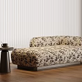 Black And White Floral Chaise Lounge With Small Side Table Near Blinds On Wooden Floor