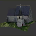 Traditional Stone Church Building With Spire Cross Dark Roof And Green Grass