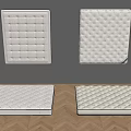 Various Quilted Mattress Designs Displayed On Wall And Wooden Floor