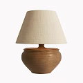 Brown And Black Table Lamps With Textured Ceramic Bases And Beige Fabric Shades