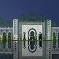 Ornate Stage With Green Domes Geometric Patterns Arched Doorways And Reflective Water Surface At Night