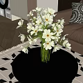 White Flowers in Glass Vase on Black Round Coffee Table with Brown Sofa and Geometric Rug