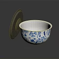 Ceramic Bowl with Blue and White Floral Pattern and Gray Lid on Black Shiny Surface