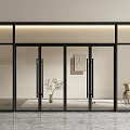Modern Glass Double Doors With Black Frame Potted Plant And Decorative Bear