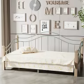 Cozy Kids Bed with Metal Frame Wooden Accents Decorative Frames and Green Plant