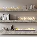 Three Tiered Stone Fireplace With Flames Books And Decorative Figurines