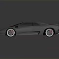 Dark Modern Sports Car With Sleek Design Rear Spoiler And Silver Alloy Wheels