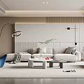Modern Living Room Interior With Light Beige Sofa Blue Accent Chair And Marble Coffee Table