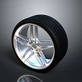 Durable Car Wheel Rim And Tire With Silver Alloy Spokes And Black Tread