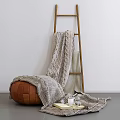 Cozy Home Decor With Knitted Blanket Wooden Ladder And Leather Bean Bag