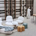Elegant Specialty Store Interior Design With Display Shelves Sofa And Tables