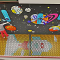 Kindergarten Play Area With Safety Fence Space Themed Decorations Planets Stars And Rocket