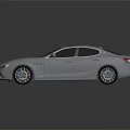 White Maserati Sports Car With Sleek Design Sunroof Modern Exterior And Alloy Wheels