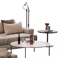 Cozy Beige Fabric Sofa With Brown Cushions And Round Coffee Table In Modern Living Interior