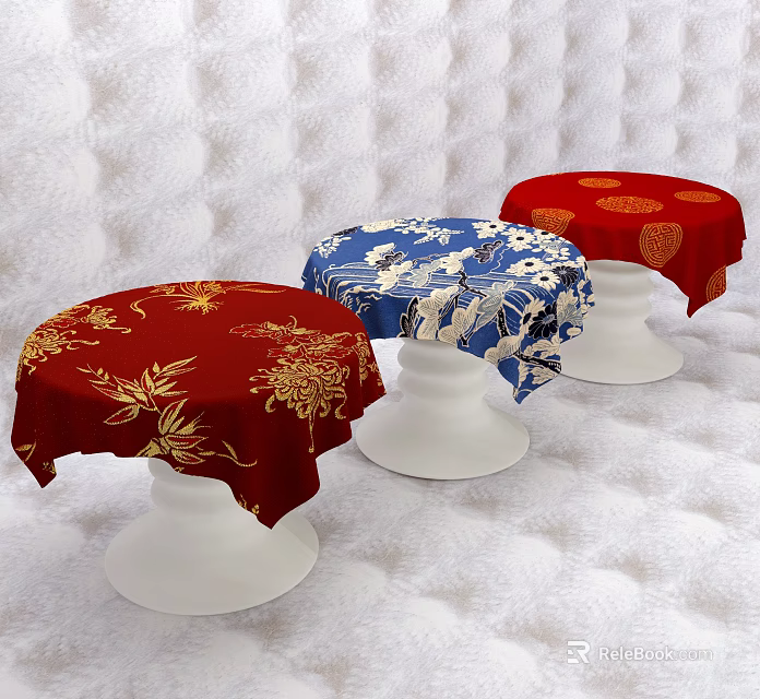 Three Round Stools With Red Blue Floral Pattern Covers And White Bases On Textured Background 3d model 