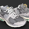 New Balance Retro Gray Sneakers With White Laces Green Sole And Mesh Details