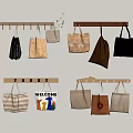 Various Style Fabric Bags Hanging On Wooden Wall With Welcome Design