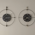 Modern Decorative Wall Clocks With Metal Circular Frames Black Dials Numeral Markers And Gold Hands