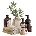 Stylish Bathroom Accessories With Towels Soaps Vase And Amber Bottles