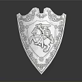 Silver Decorative Shield Featuring Ornate Carvings and Knight on Horseback Design