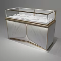 Retail Store Glass Display Case With Marble Countertop Golden Frame Lighting And White Tableware