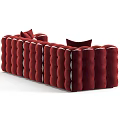 Burgundy Velvet Three Seater Sofa With Tufted Design And Decorative White Cushions