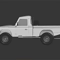 Silver Vintage Pickup Truck With Open Bed Front Grille And Rugged Design