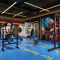 Modern Fitness Gym Interior With Treadmills Fitness Equipment Red Boxing Statue And Large Screens
