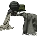 Soft Green and Gray Decorative Pillows with Cozy Knitted Blankets and Tassel Details