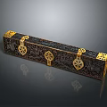 Black And Gold Decorative Box With Intricate Carvings And Golden Clasps
