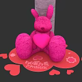 Pink Rabbit Doll Holding Heart with Small Hearts and Gray Block Background