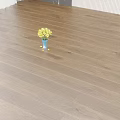 Dark Brown Wooden Floor with Natural Texture and Blue Vase of Yellow Flowers