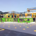 Modern Museum Building With Colorful Yellow Green Structures And Open Exhibition Space