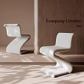 Modern White Dining Chairs with Unique Sleek Curved Design Wooden Wall and Light Shadow Effects